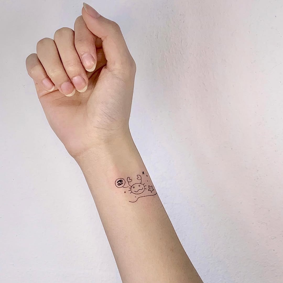 Charming Cancer Zodiac Tattoo Design on Wrist Tattoo Design