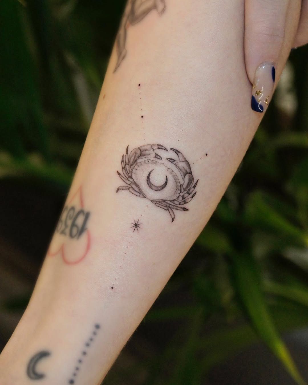 Elegant Cancer Zodiac Tattoo with Moon Motif Tattoo Design