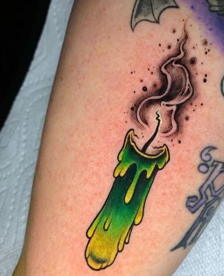 Melting Green Candle with Dramatic Smoke Tattoo Design