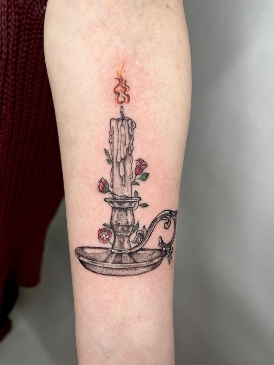 Vintage Burning Candle with Floral Accents Tattoo Design