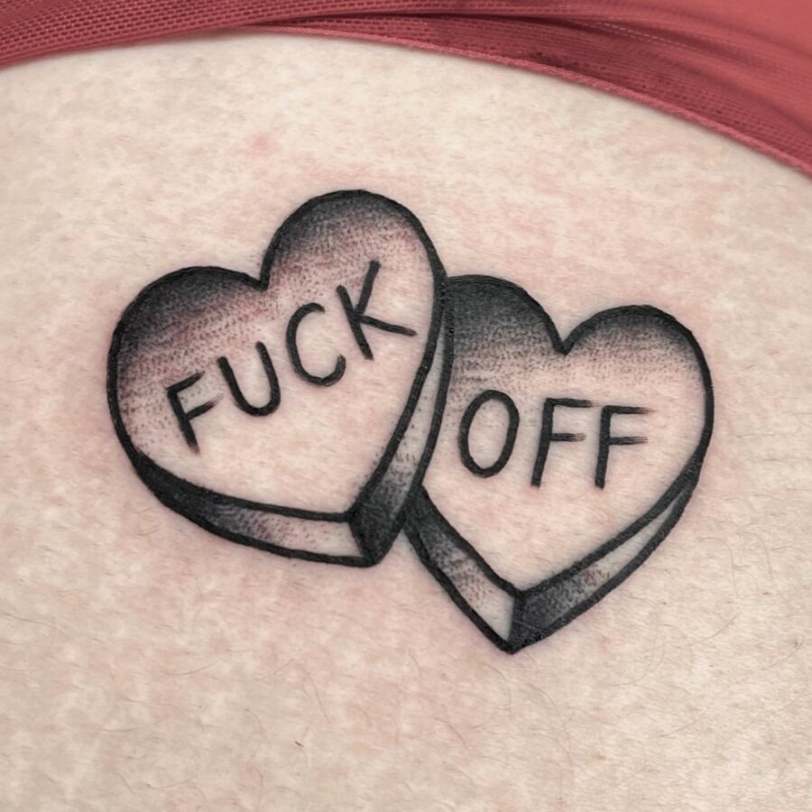 Bold message in playful candy heart design Tattoo Design