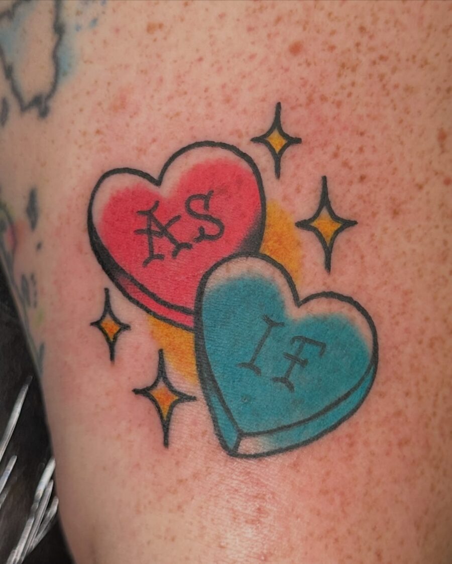 Charming candy heart tattoo design featuring fun phrases Tattoo Design