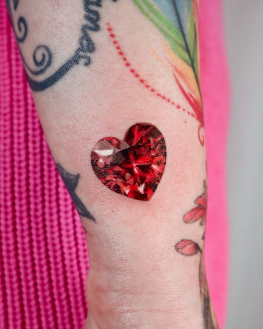 Charming candy heart tattoo with playful vibes Tattoo Design