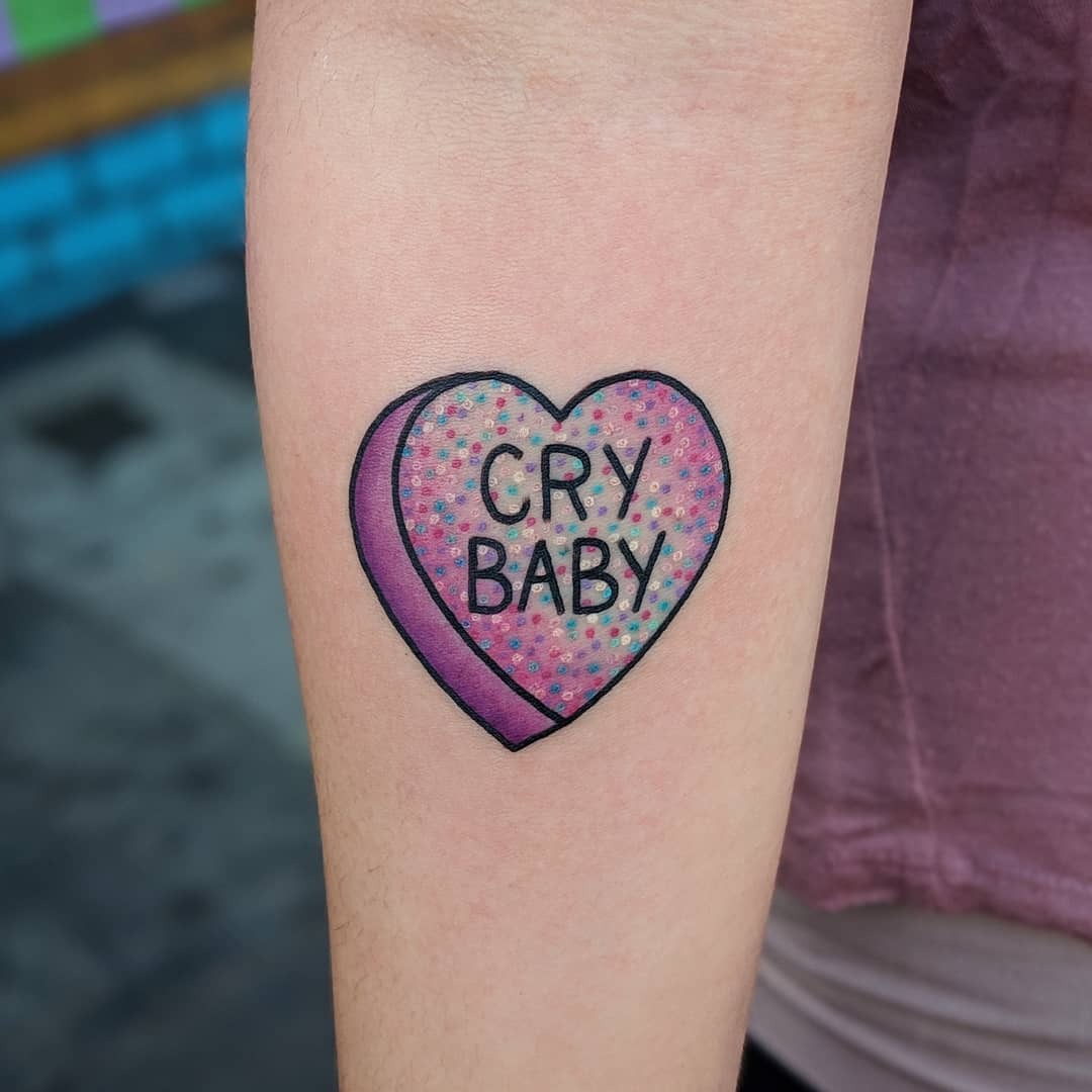 Charming minimalist red candy heart tattoo Tattoo Design