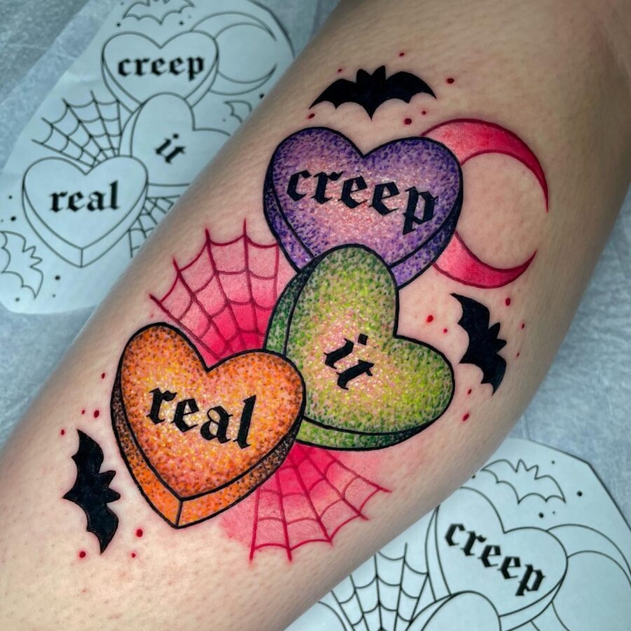 Colorful candy heart tattoo with spooky vibes Tattoo Design
