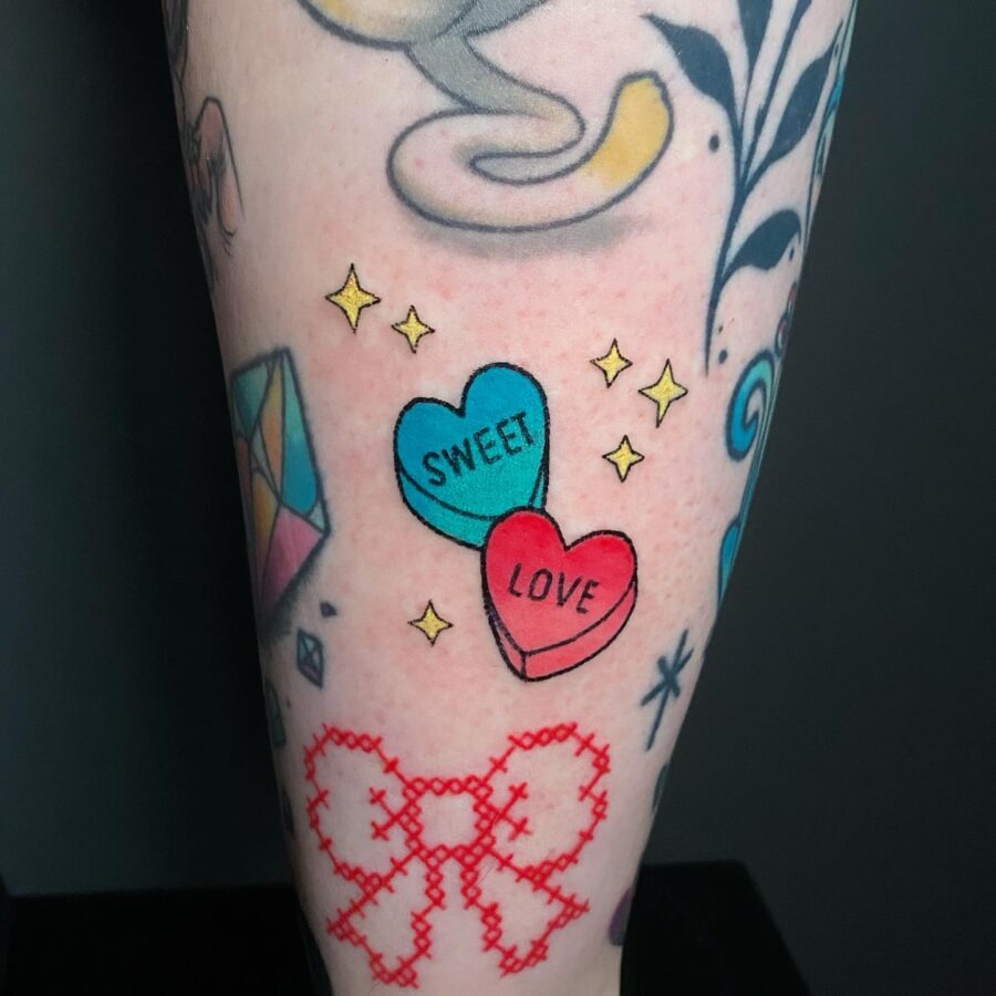 Colorful candy heart tattoos with playful vibes Tattoo Design