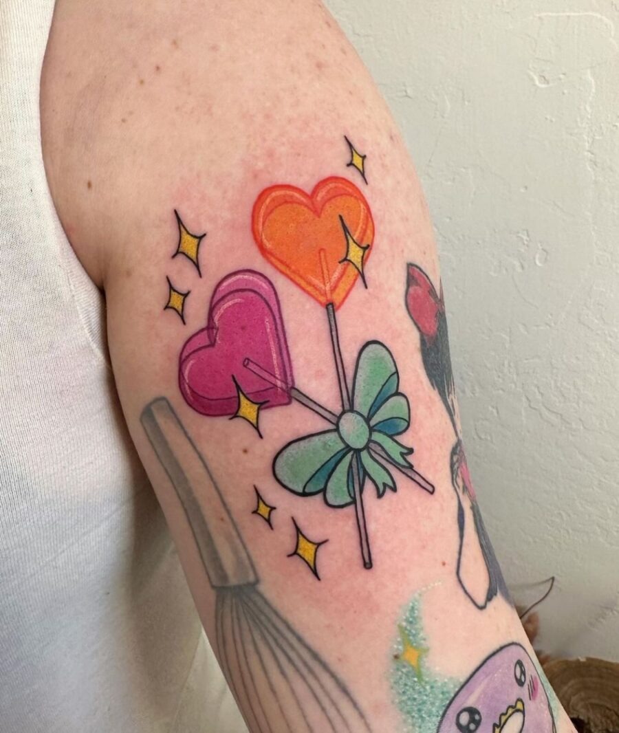 Colorful candy hearts with playful lollipops Tattoo Design
