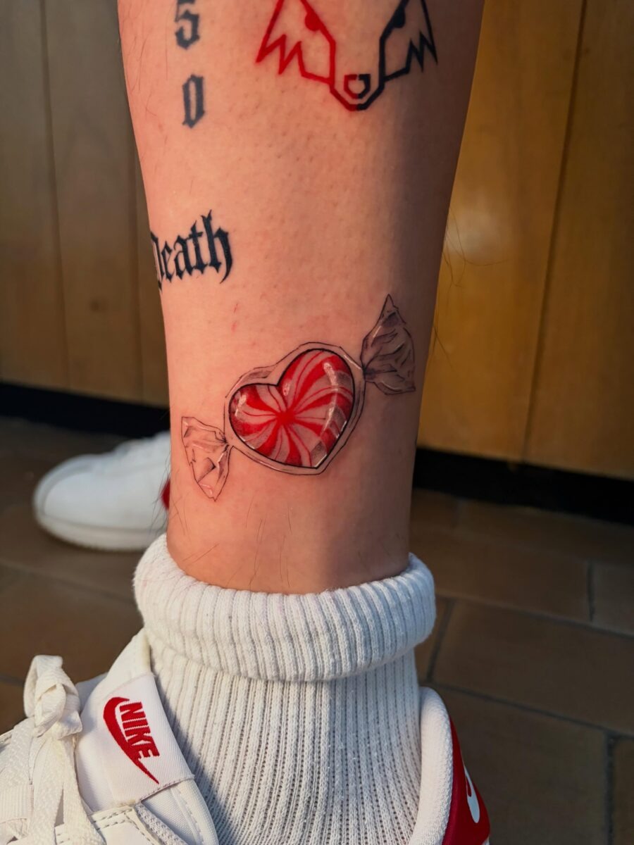 Colorful heart candy tattoo with vibrant design Tattoo Design