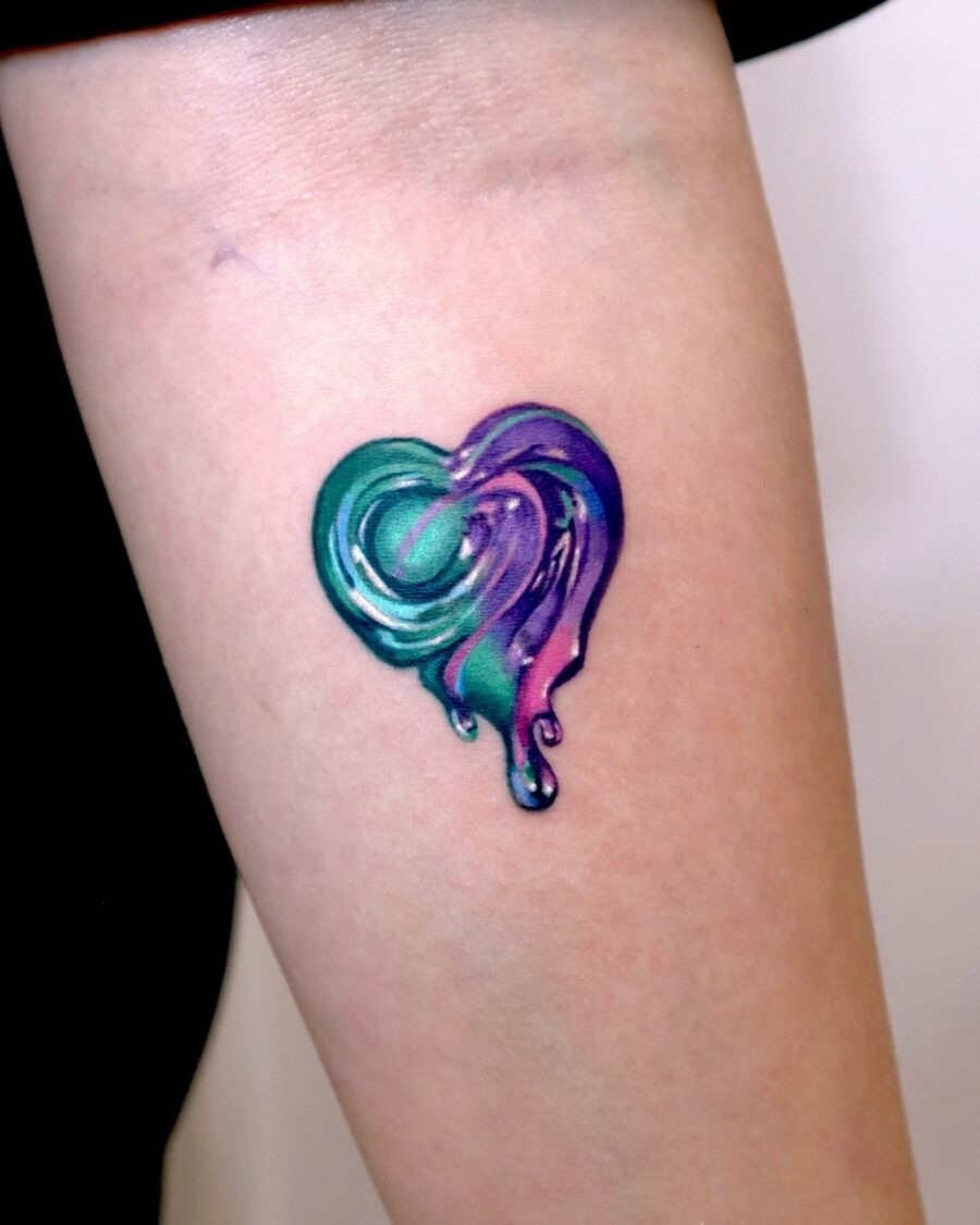 Romantic candy heart tattoos with floral accents Tattoo Design