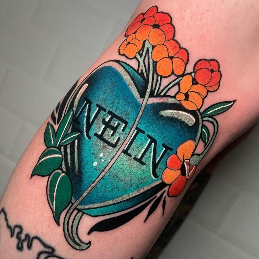 Vibrant heart tattoo with a bold message Tattoo Design