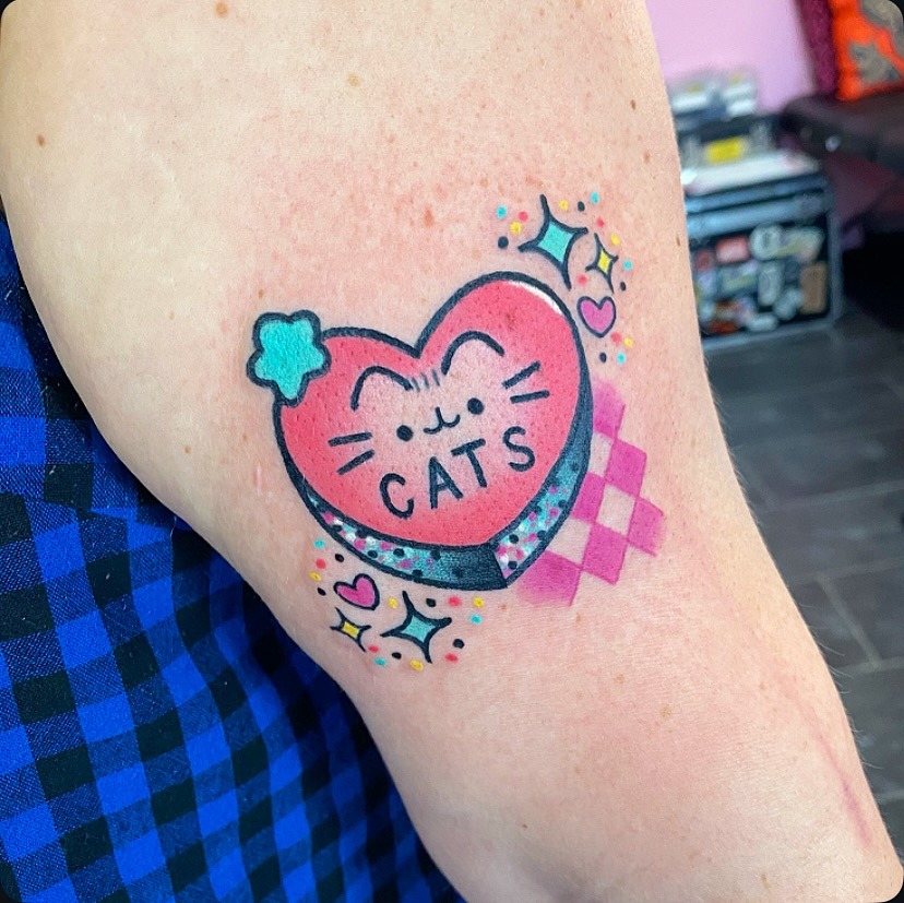 Whimsical Candy Heart Tattoo Featuring Adorable Cats Tattoo Design
