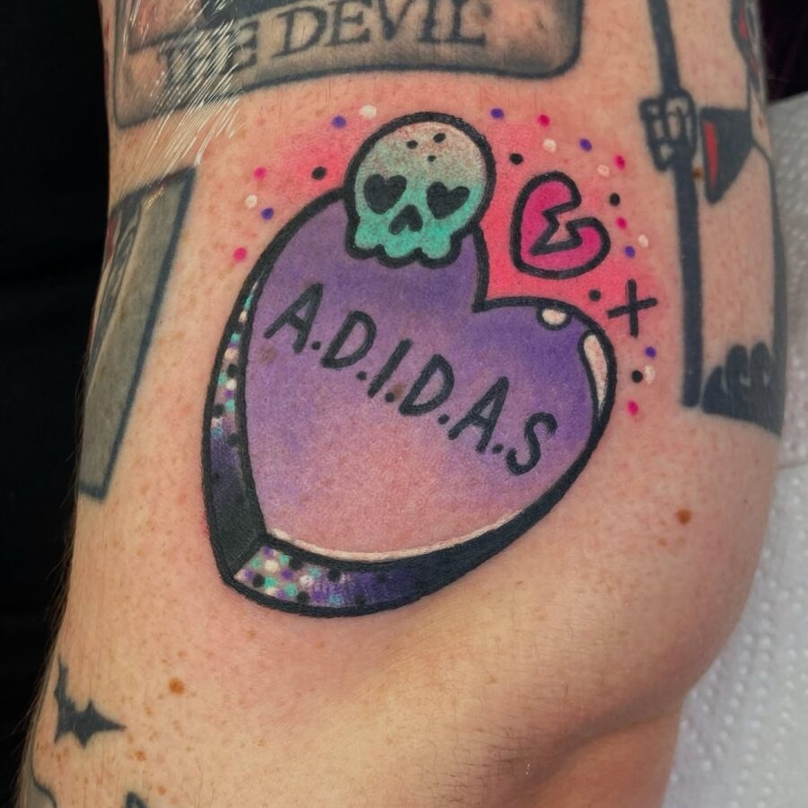 Whimsical skull candy heart tattoo design Tattoo Design