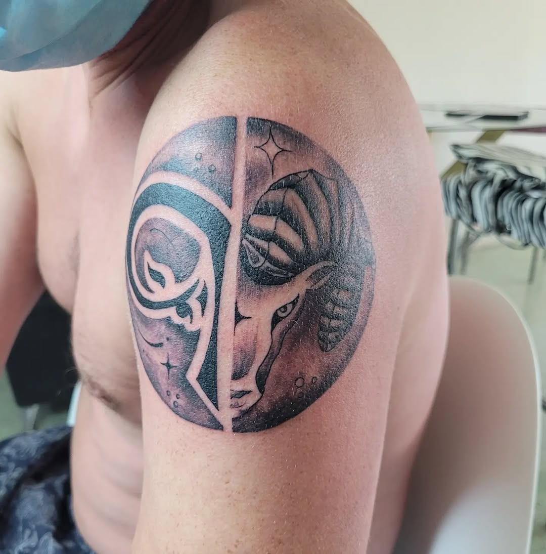 This tattoo showcases a captivating blend of Capricorn elements within a circular design.
