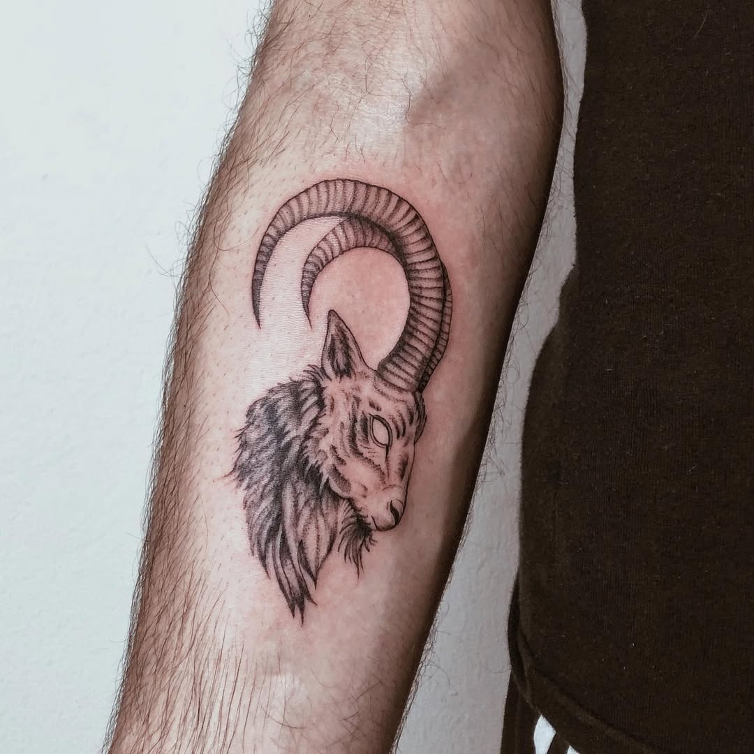 This Capricorn tattoo showcases a beautifully detailed goat head with prominent horns.