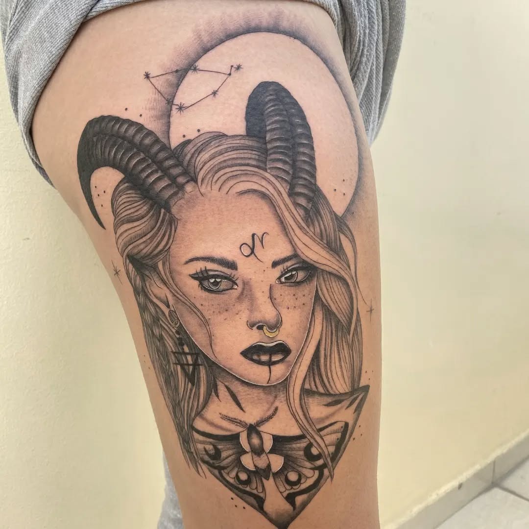 This stunning Capricorn tattoo features a female portrait adorned with majestic horns.