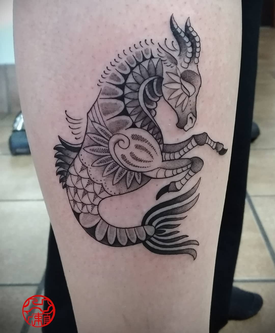 This Capricorn tattoo features a beautifully intricate design, capturing the essence of the zodiac sign.