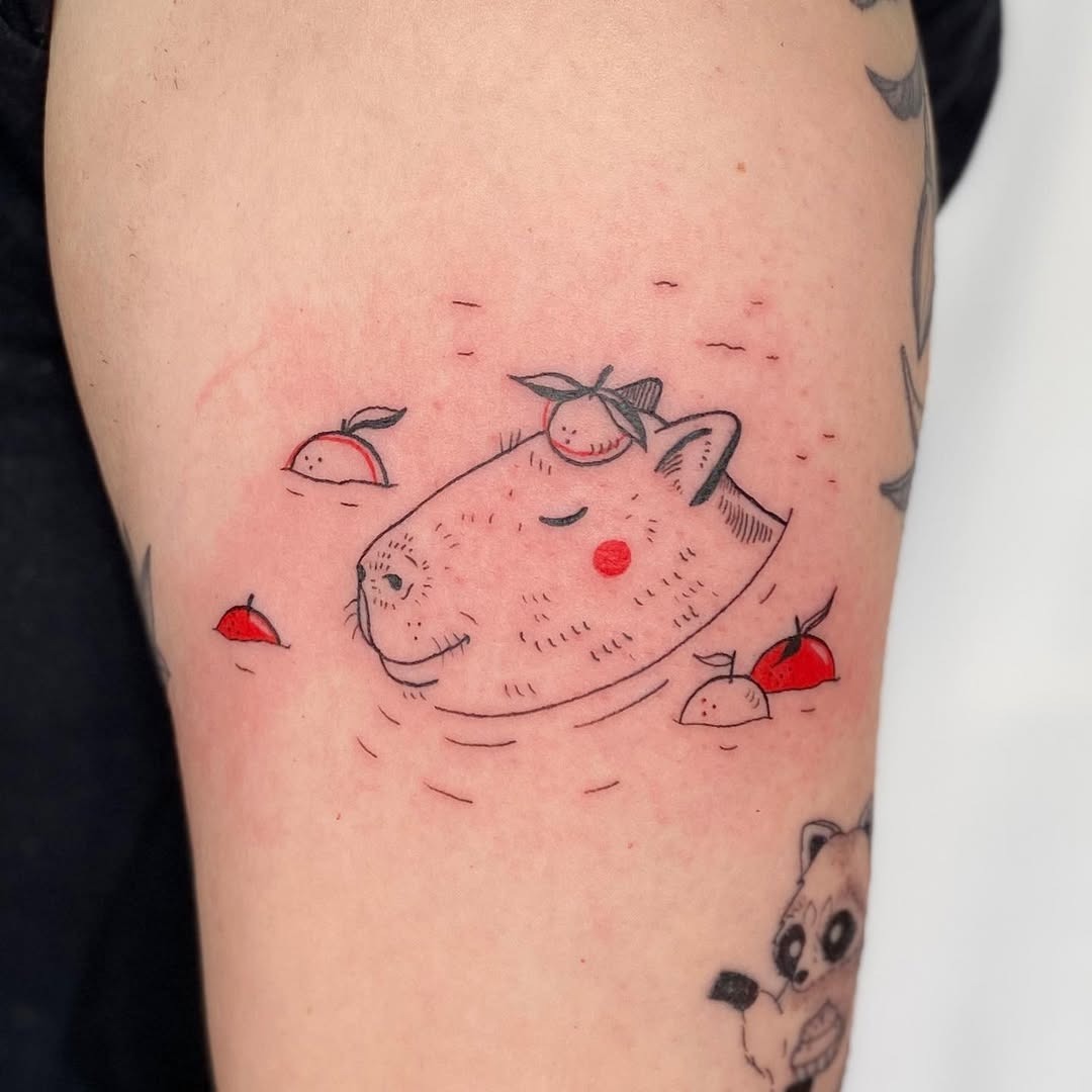 Adorable capybara enjoying a peaceful swim Tattoo Design