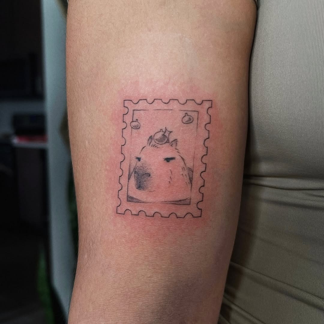 Adorable capybara tattoo in stamp design Tattoo Design