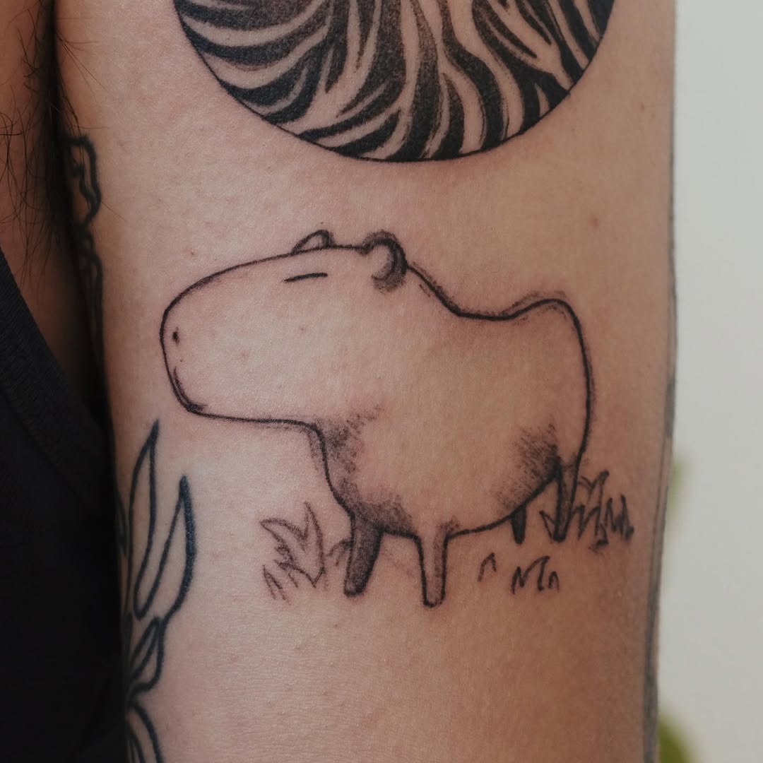 Adorable capybara tattoo with minimalist style Tattoo Design