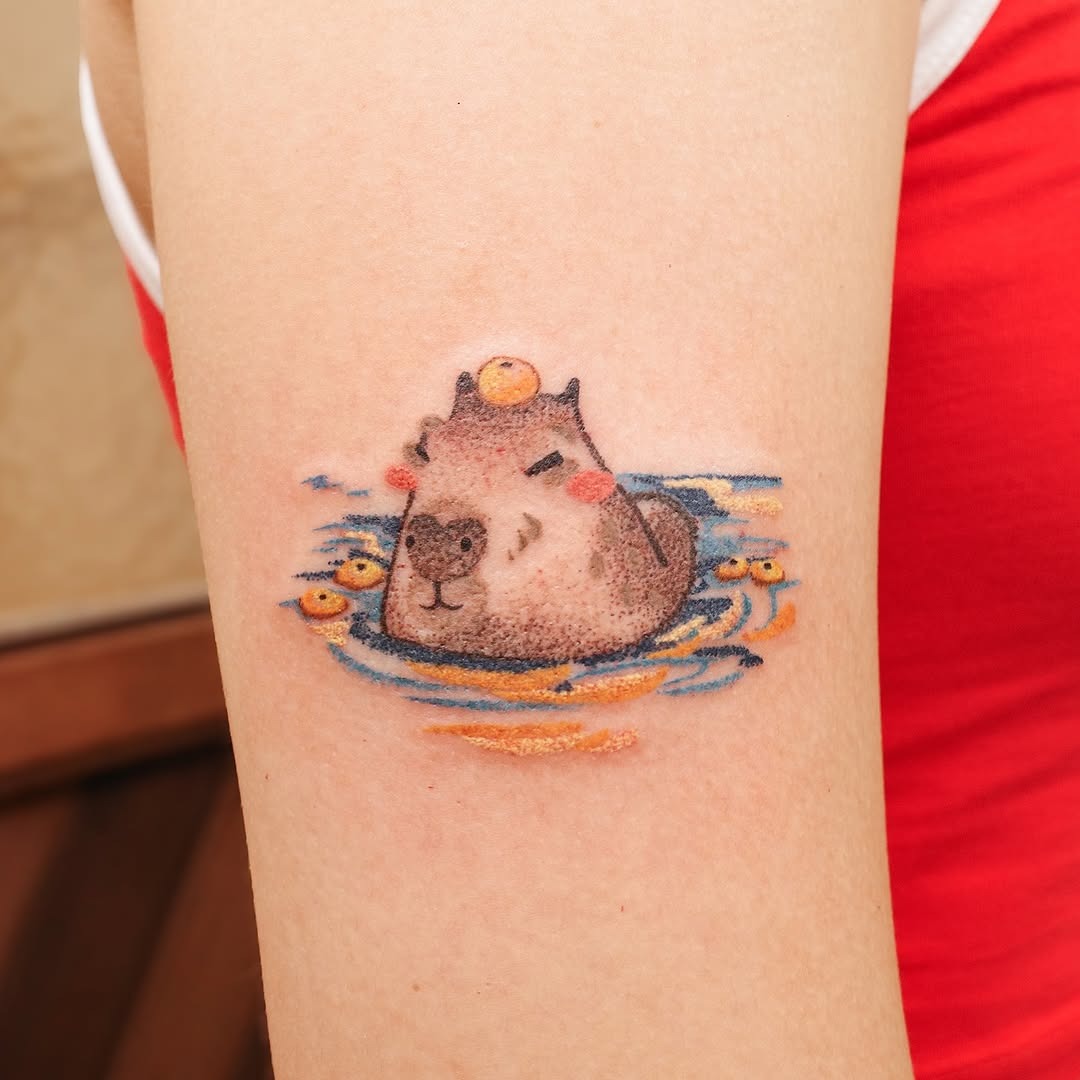 Charming capybara enjoying a serene water scene Tattoo Design
