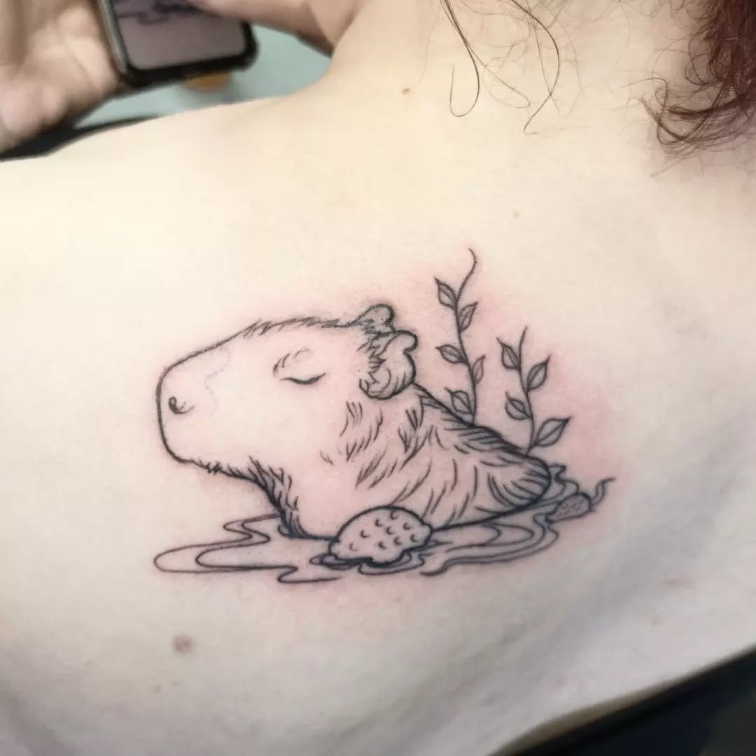 Charming capybara tattoo exuding calm vibes Tattoo Design