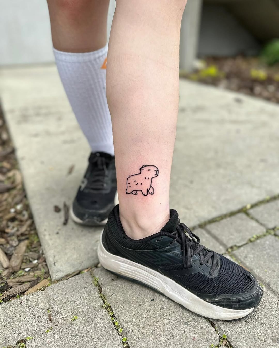 Cute capybara tattoo on the leg Tattoo Design