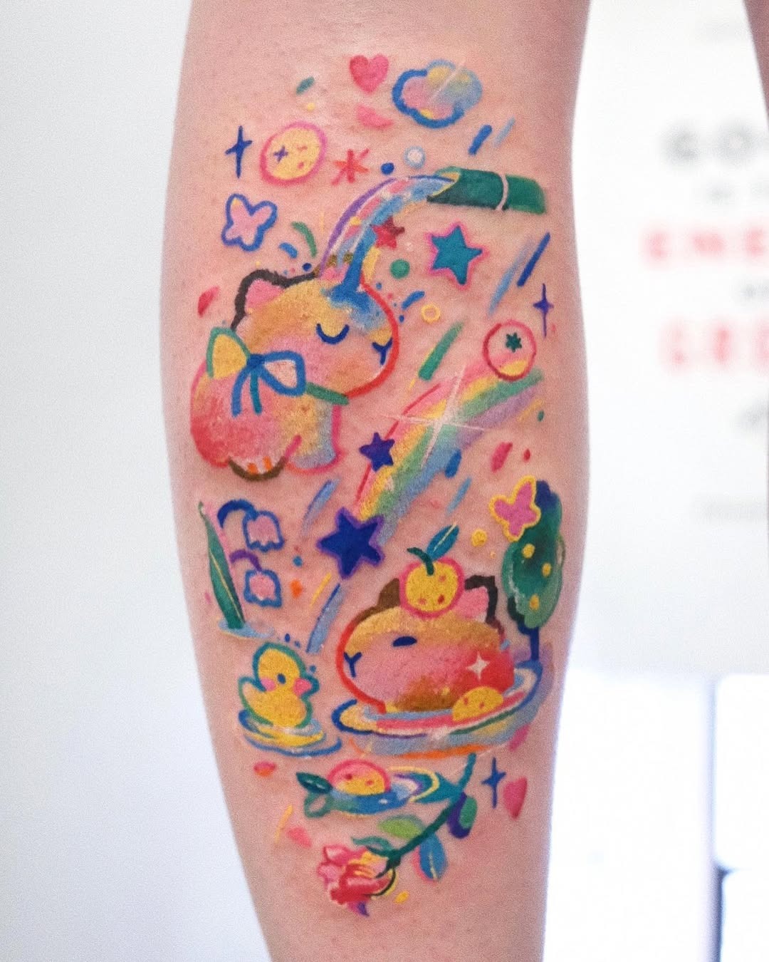 Vibrant capybara-themed whimsical tattoo art Tattoo Design