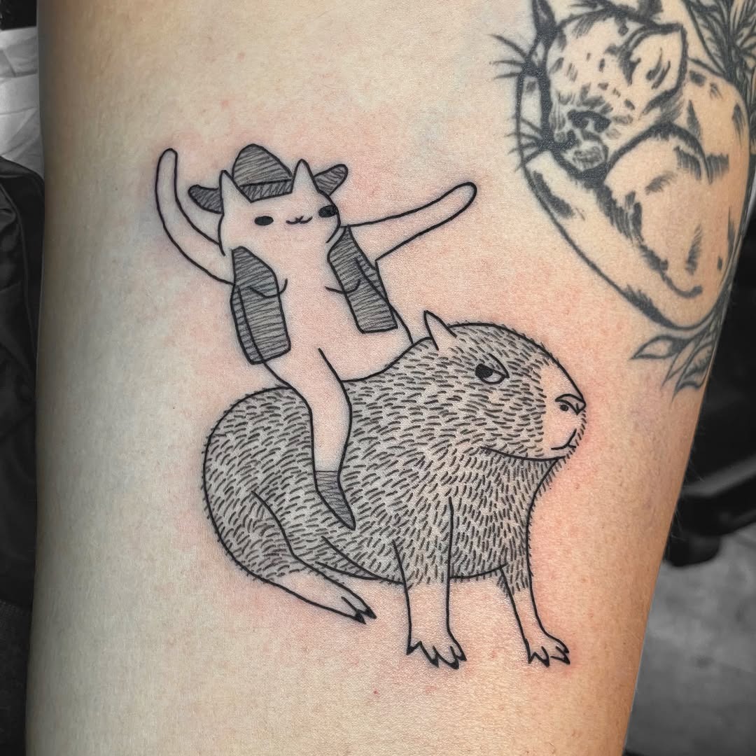 Whimsical capybara tattoo with character twist Tattoo Design