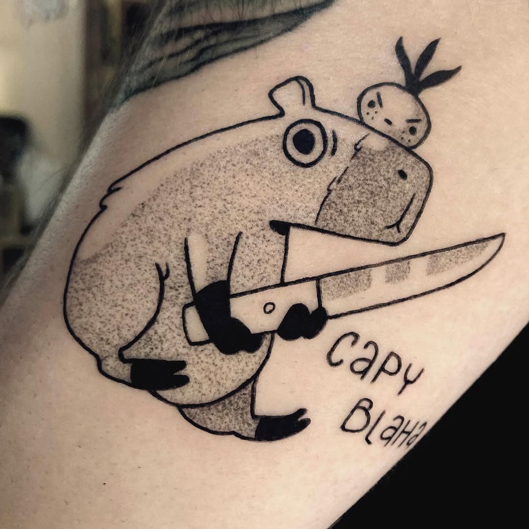 Whimsical Capybara Tattoo with Knife Tattoo Design