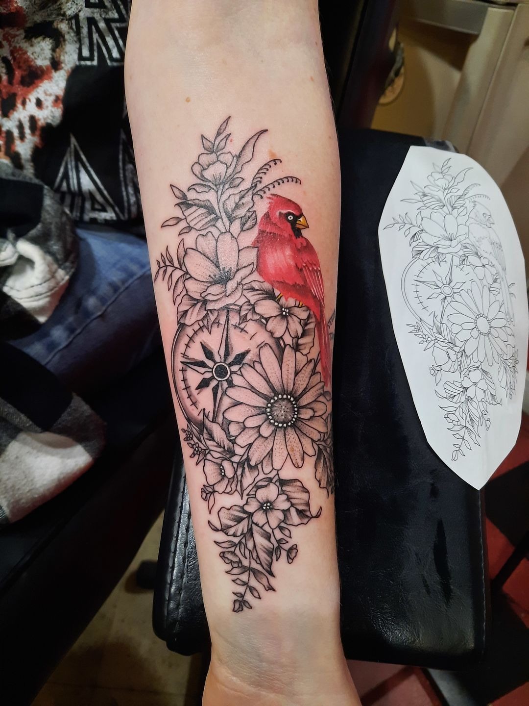 Red Cardinal with Flowers and a Compass Tattoo Design