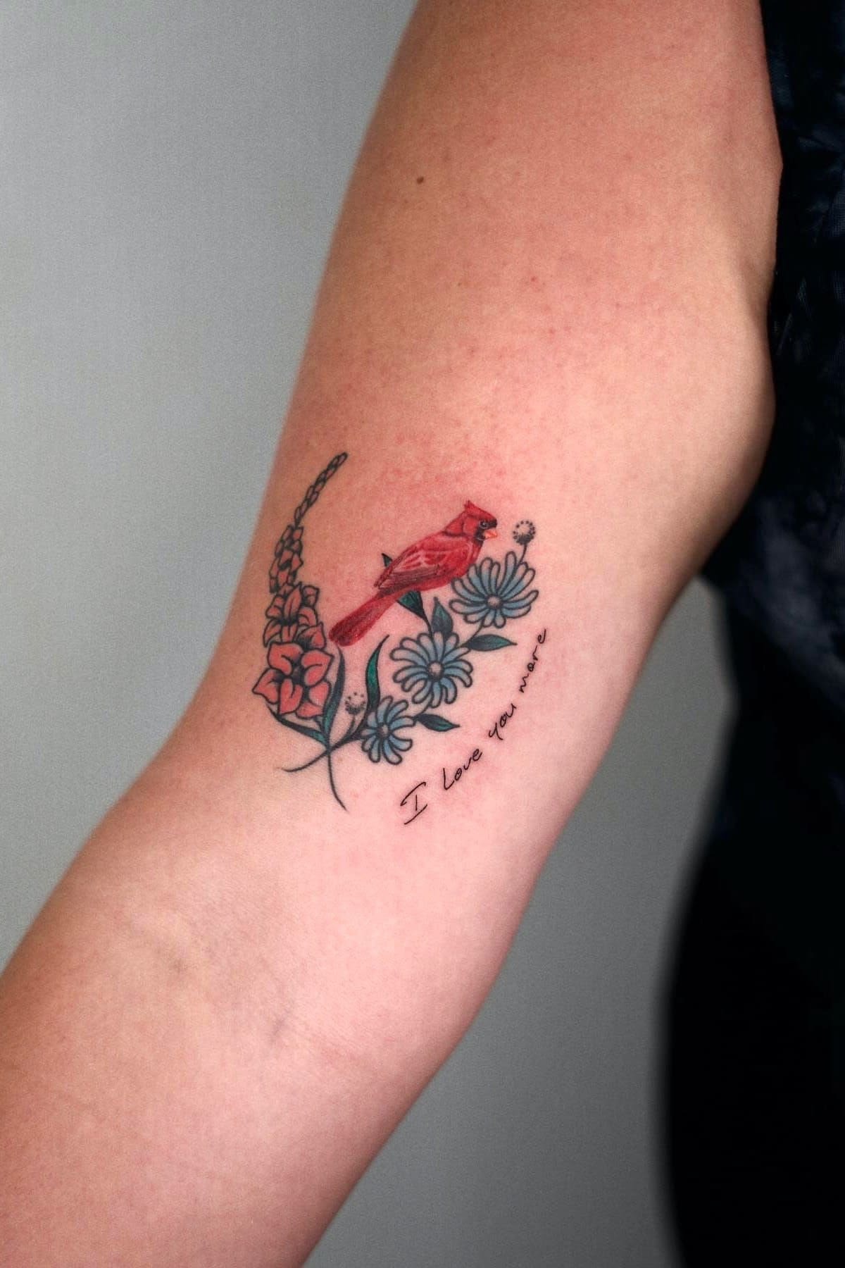 Small Cardinal Memorial with Wildflowers and Script Tattoo Design