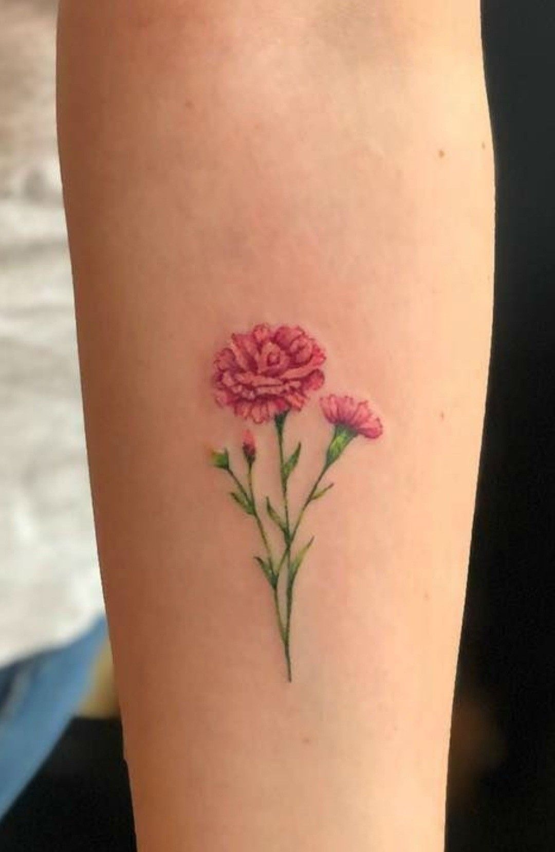 Tiny Pink Carnation Sprig Tattoo Design