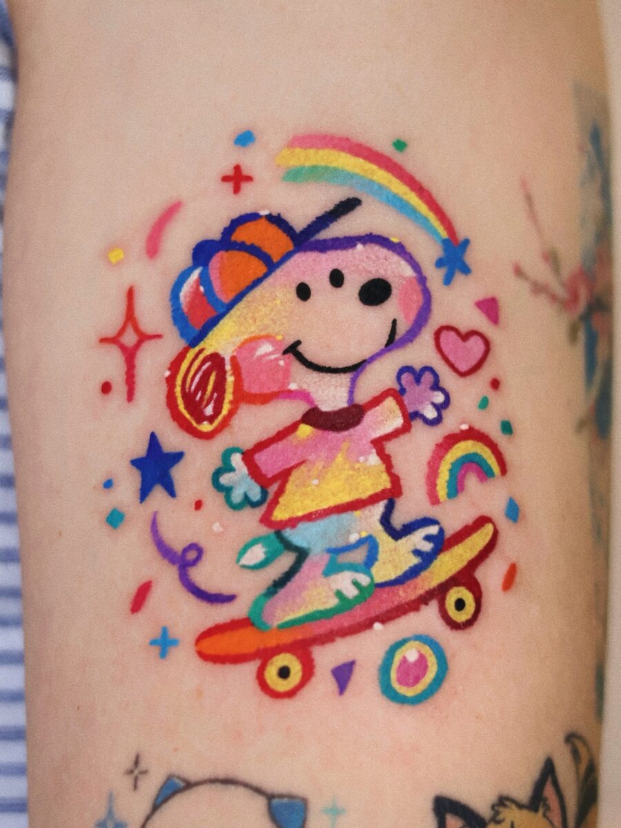 Bright and playful Snoopy skateboard tattoo Tattoo Design