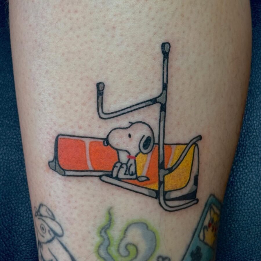 Charming Snoopy Tattoo on White Skin Tattoo Design