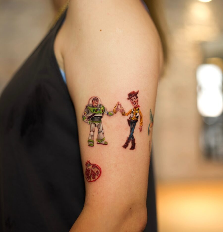 Colorful cartoon tattoos of iconic characters Tattoo Design