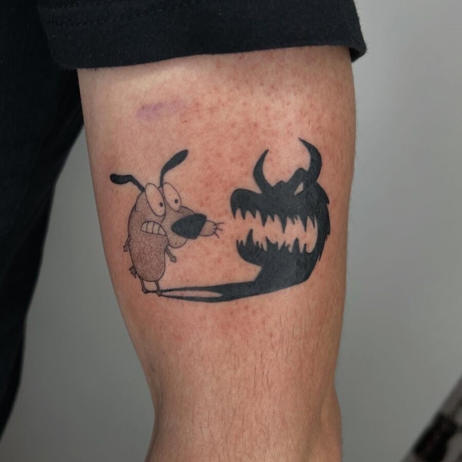 Courage faces his shadowy foe in ink Tattoo Design
