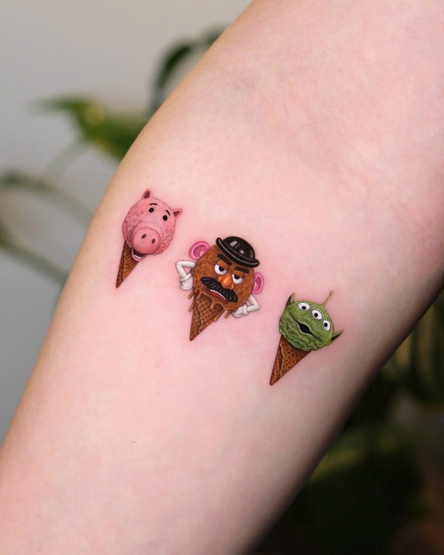 Fun and whimsical cartoon tattoos in vibrant colors Tattoo Design