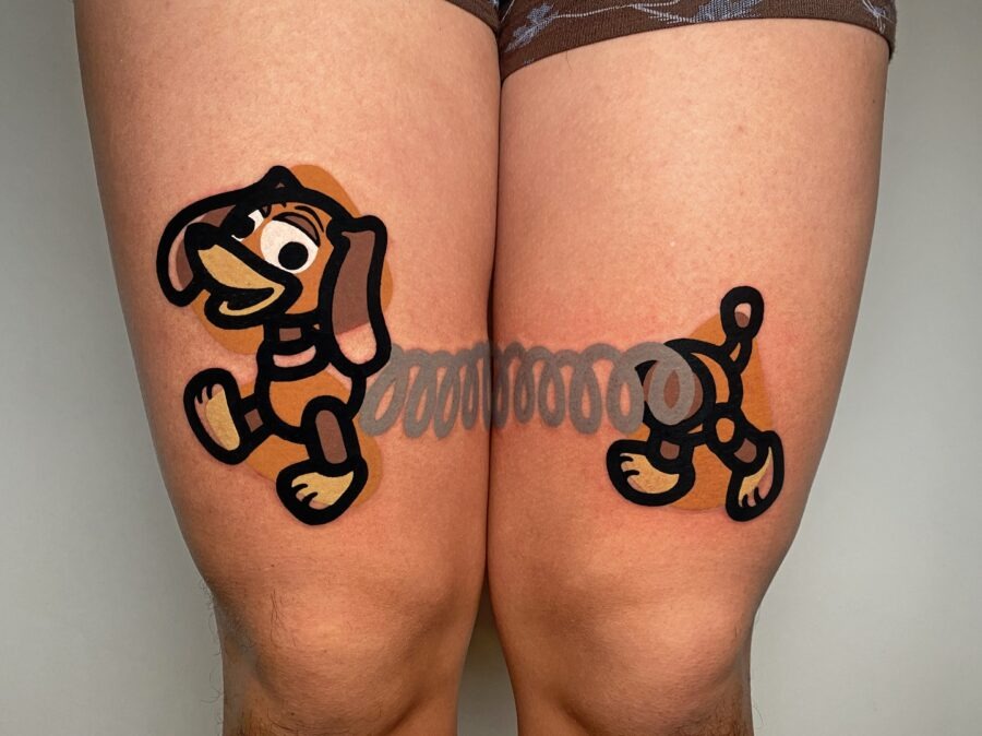 Fun cartoon dog tattoos on thighs Tattoo Design