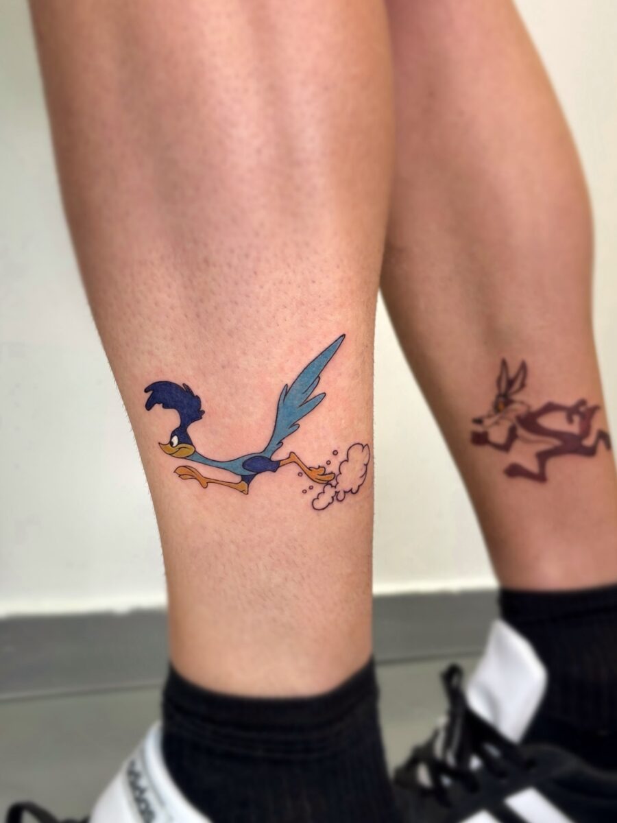 Playful Roadrunner and Coyote Cartoon Tattoos Tattoo Design