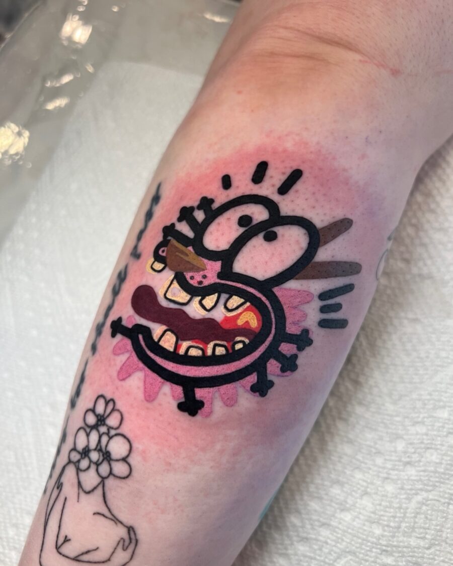 Unique cartoon tattoo featuring a quirky character Tattoo Design