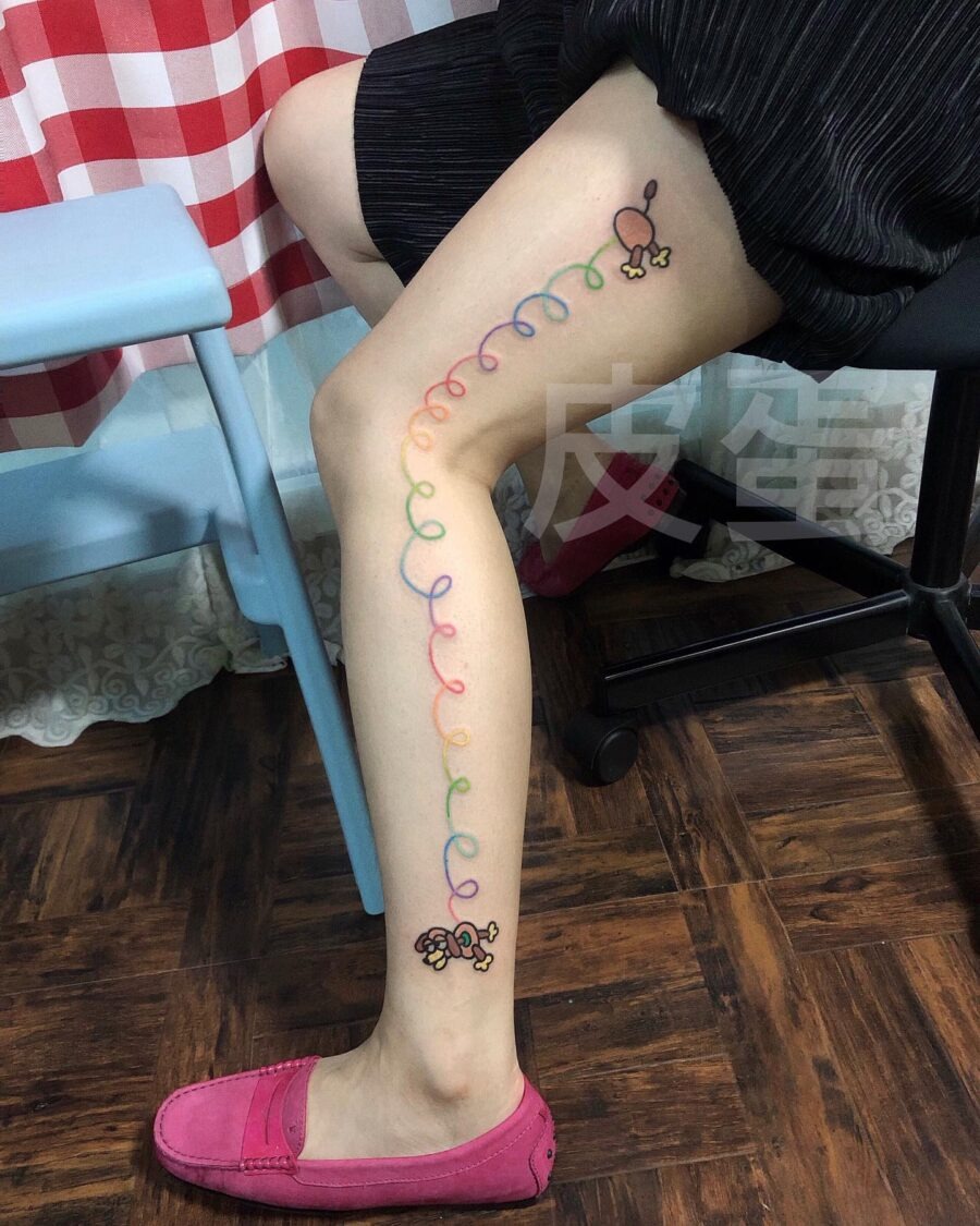 Whimsical cartoon tattoos bring joy to life Tattoo Design