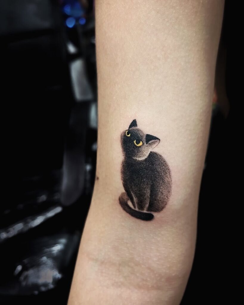 A Subtle and Captivating Black Cat Tattoo Design