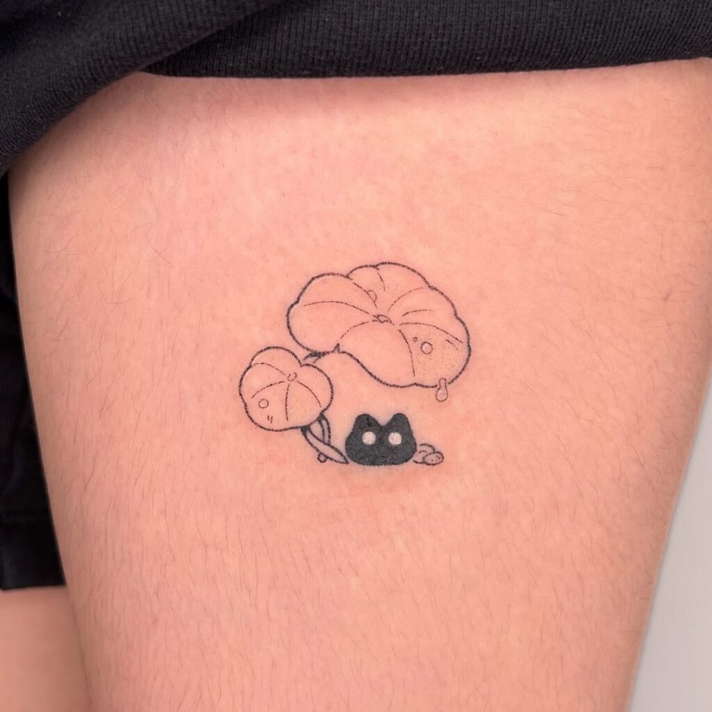 Hiding Cat with Leaves Tattoo Design