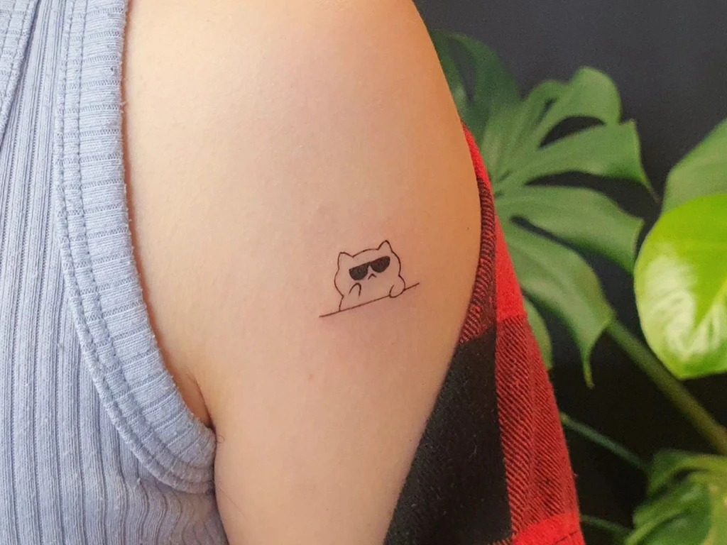 Minimalist Cool Cat Tattoo - A Tiny Design with Attitude Tattoo Design