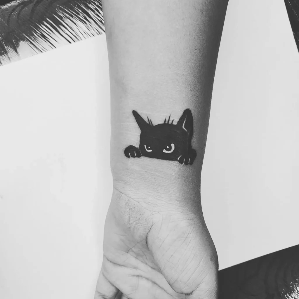 Peeking Black Cat Tattoo - Mysterious and Adorable Tattoo Design