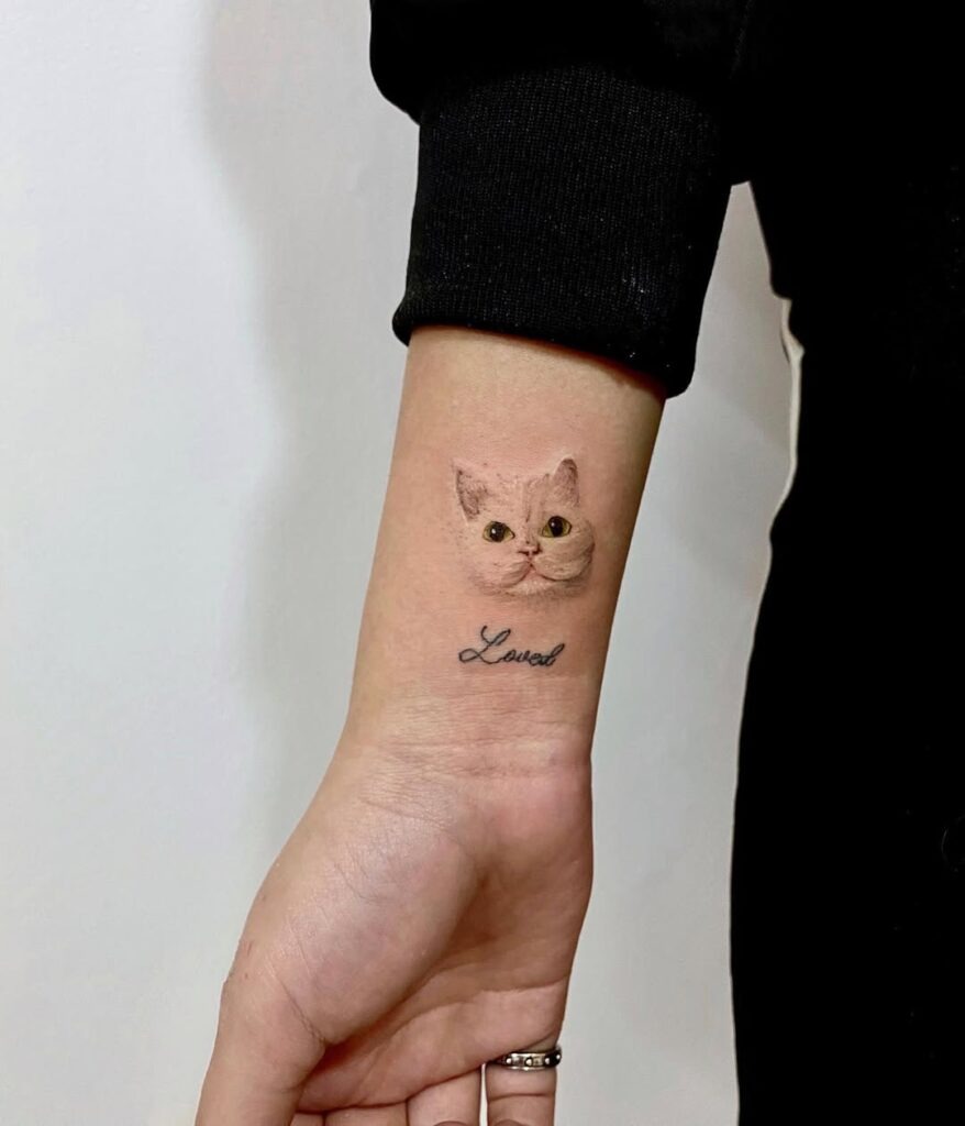 Realistic Cat Face Wrist Tattoo - A Heartfelt Tribute Tattoo Design