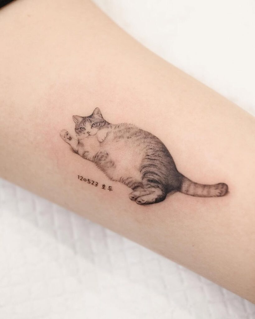 Restful Cat Tattoo with Personalized Touch Tattoo Design