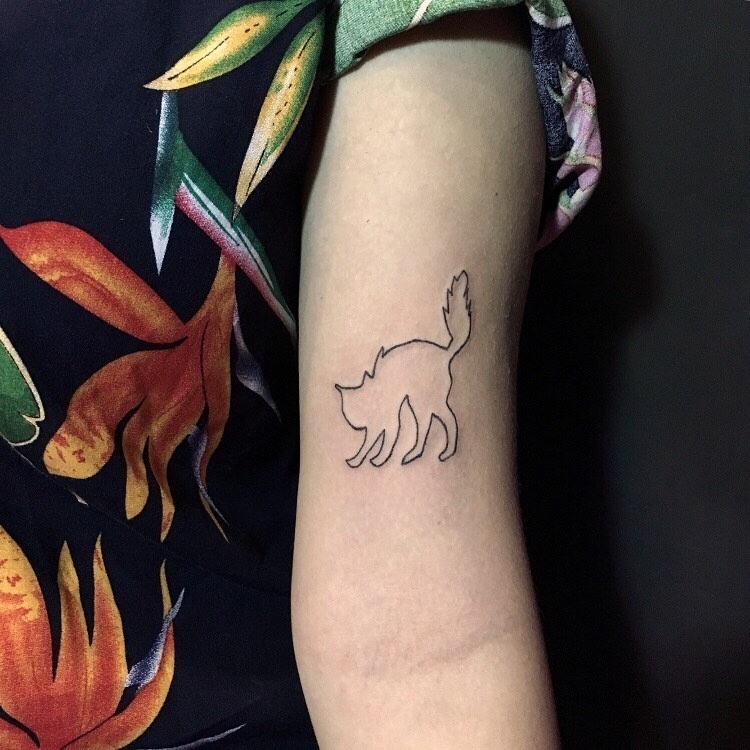 Spooky Cat Outline Tattoo - Minimal and Full of Personality Tattoo Design