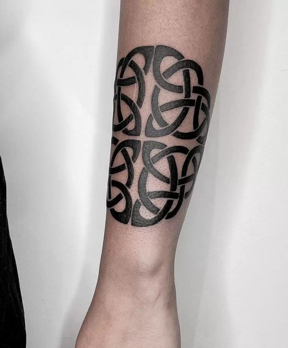 Purple-Shaded Trinity Knot Tattoo Design