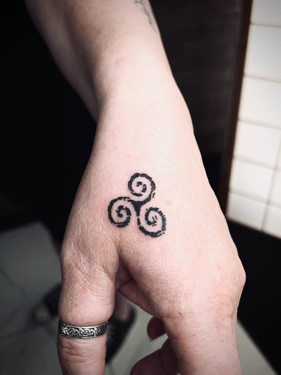 Elegant Celtic swirl tattoo on the hand Tattoo Design